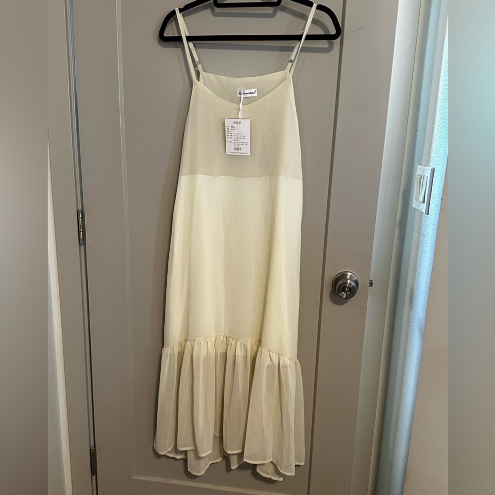 Elegant Cream Sleeveless Dress